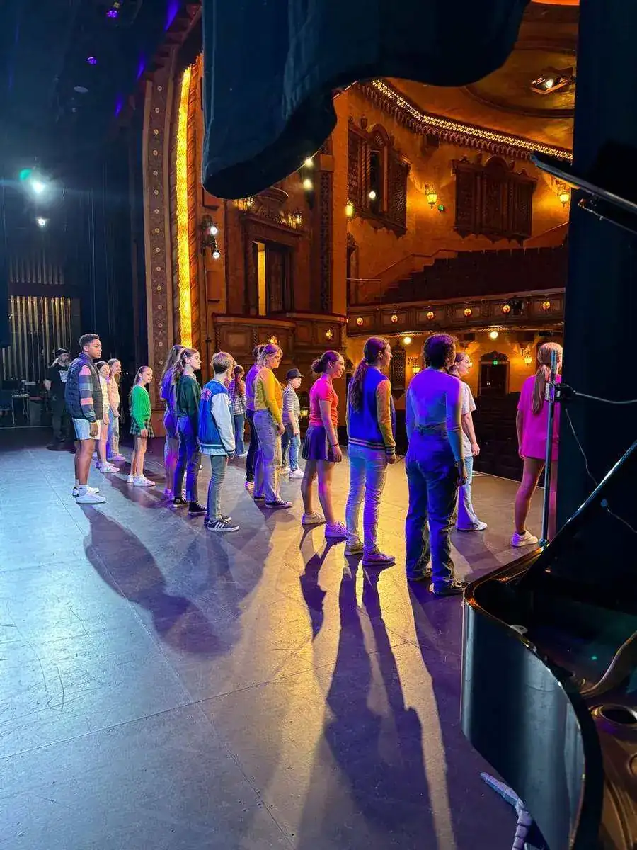 Pelican performers rehearsing on stage at the Civic Theatre, Newcastle